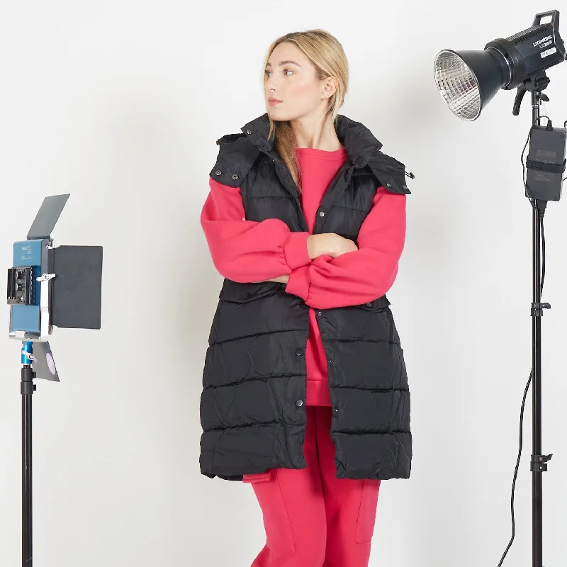 Wholesale sleeveless puffer coat with flip pockets on the front